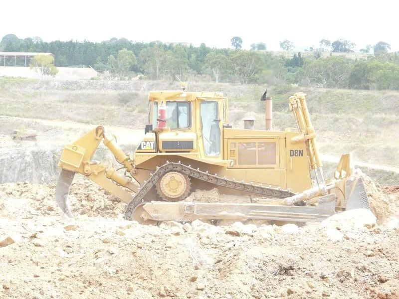 Excavator Digging A Hole — Mike Barlow Earthmoving Pty Ltd in Rockhampton, QLD