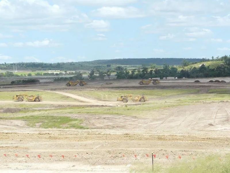 Two Bulldozers Are Doing Landscape Cleaning — Mike Barlow Earthmoving Pty Ltd in Rockhampton, QLD