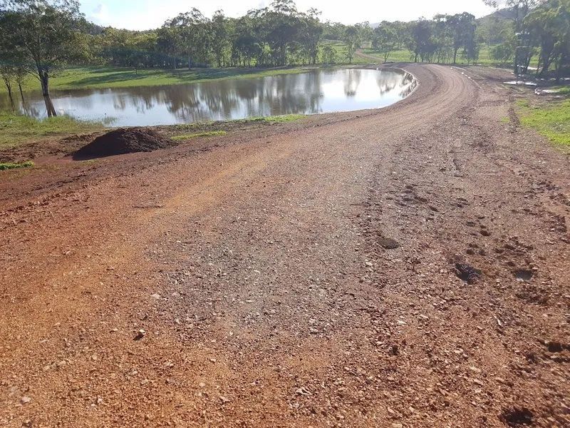 Road With Lake On The Side — Mike Barlow Earthmoving Pty Ltd in Rockhampton, QLD