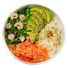 Poke bowl: Salmon, avocado, shrimp, seaweed, and rice in a white bowl, sprinkled with sesame seeds.