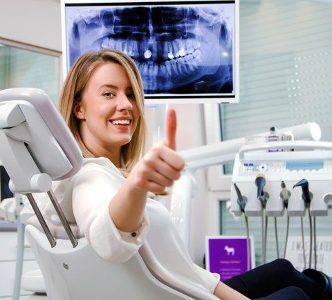 Dentist — Smiling Dental Patient In Florence, AL