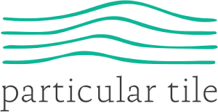 A logo for a company called particular tile.