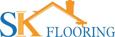 The logo for six flooring shows a house with a chimney on the roof.