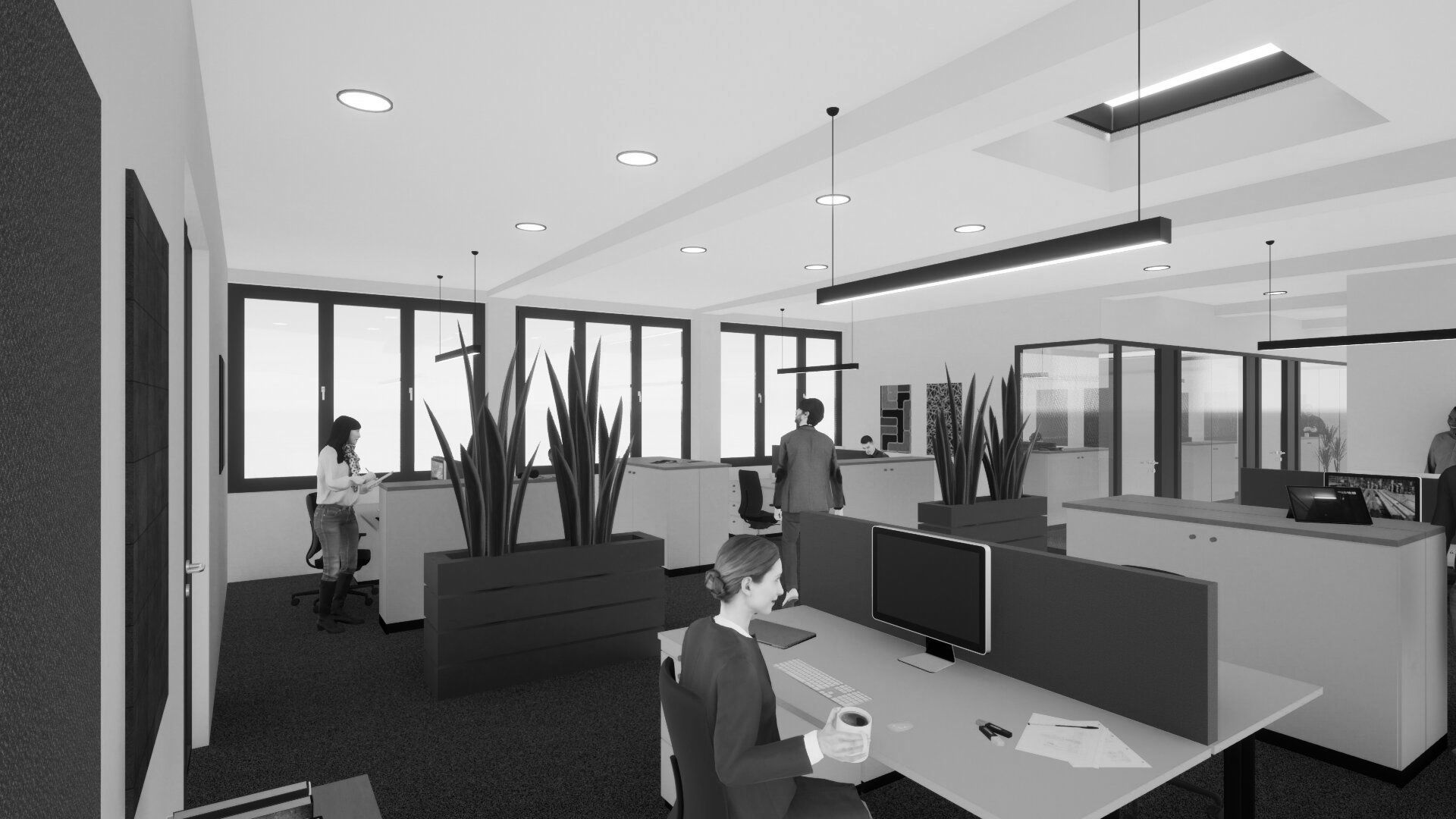 Ein Schwarzweißfoto eines Mannes, der in einem Büro an einem Schreibtisch sitzt.