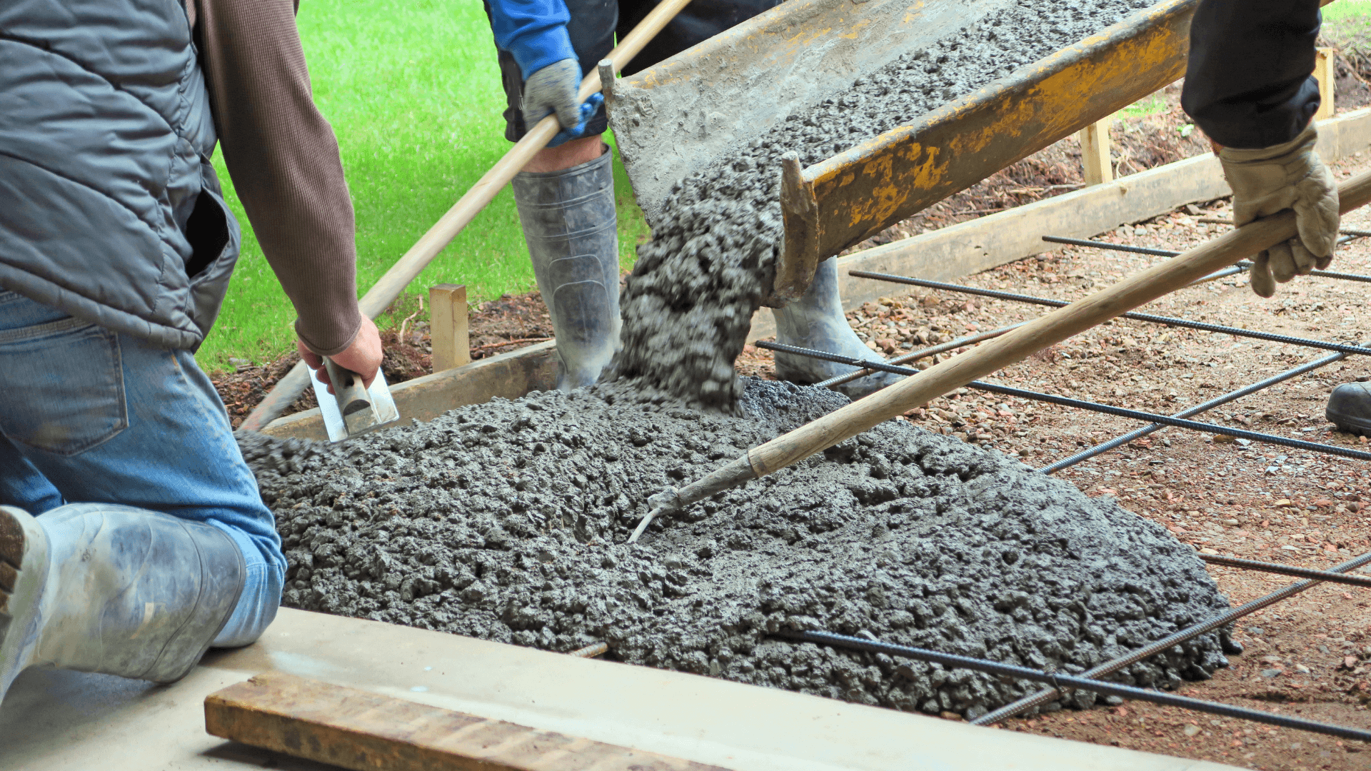 patio contractor installs concrete on a back yard in maple grove, MN