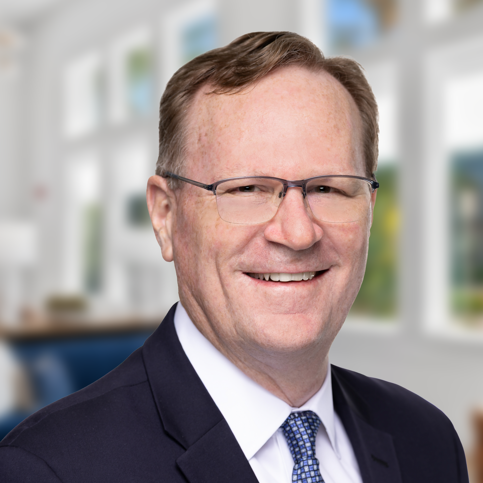 Headshot of Chris Phillips, Executive Vice President and Chief Financial Officer