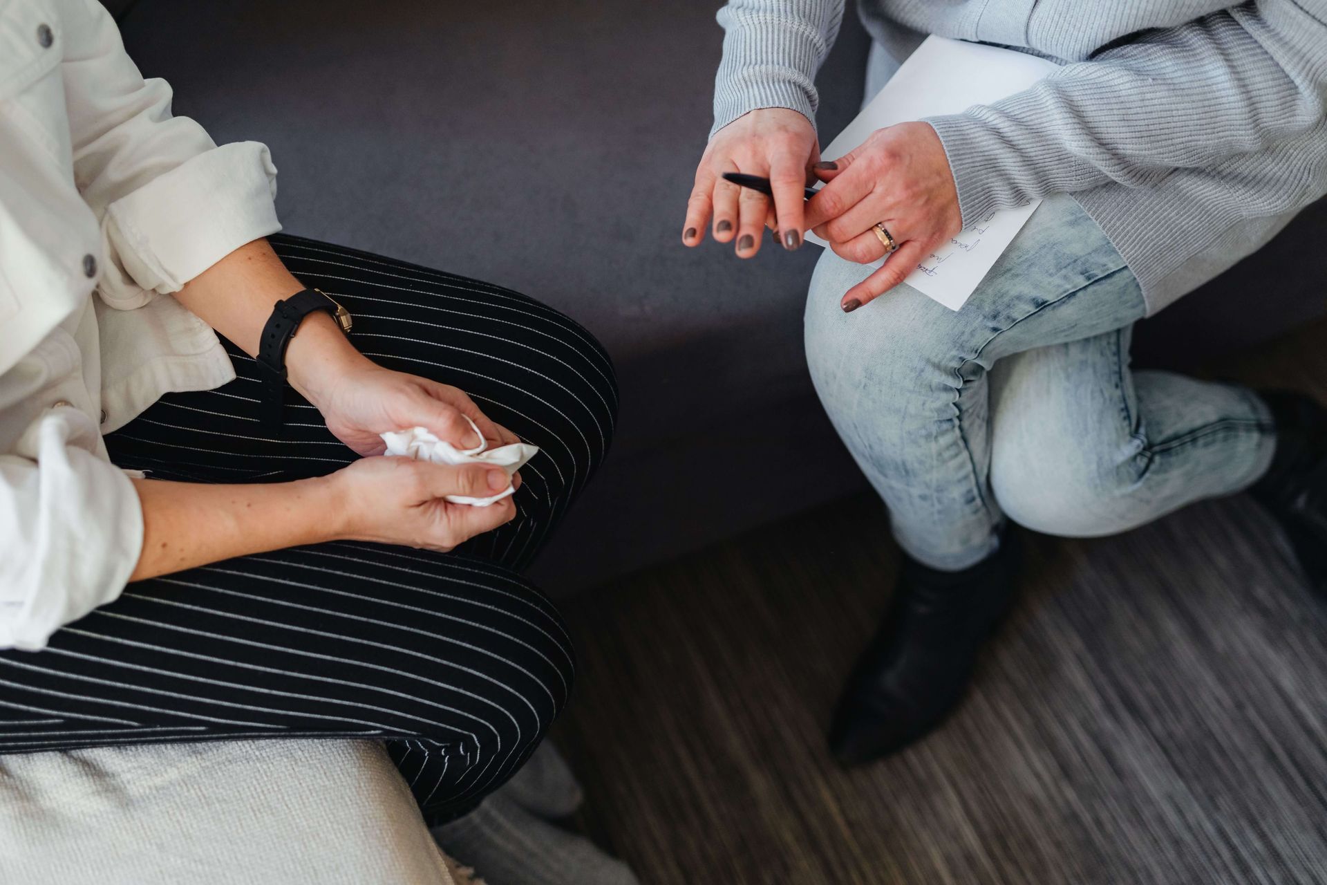Close-up of a therapy session illustrating therapy for anxiety and grief in Omaha, NE.