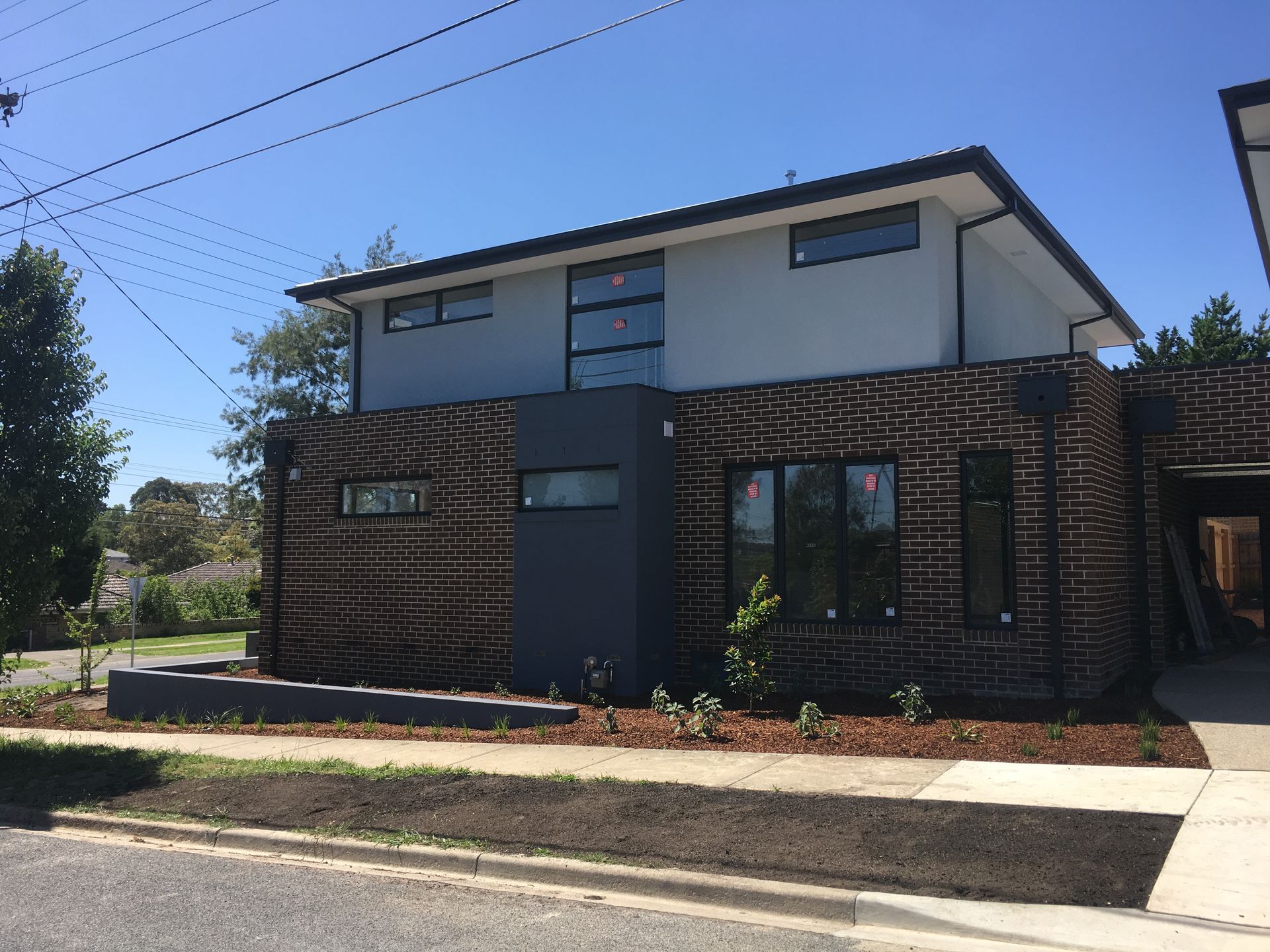 A large brick house with a lot of windows