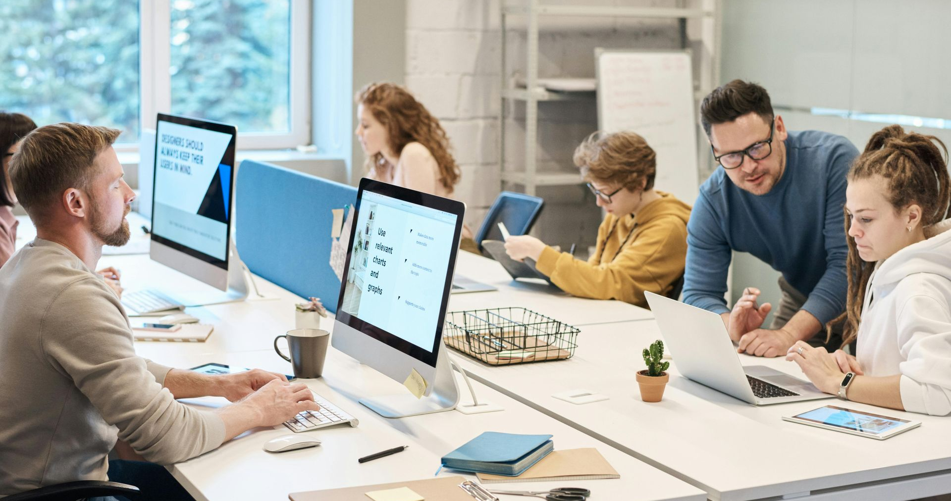 employees working together and on computers