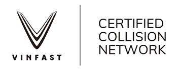 Tesla Approved Collision Center logo.