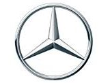 Mercedes-Benz logo: a silver three-pointed star inside a silver circle.