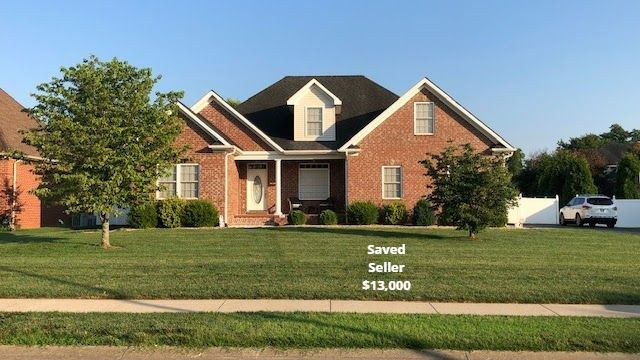 Brick house with well-kept lawn; saved seller $13,000.