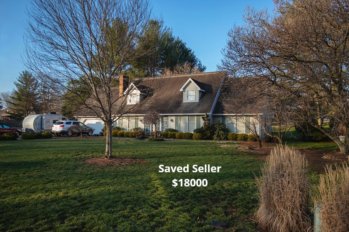 House with green lawn; trees surround. Text: Saved Seller $18000.