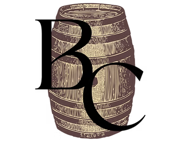 A wooden barrel with the letter b and c on it