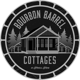 A black and white logo for bourbon barrel cottages