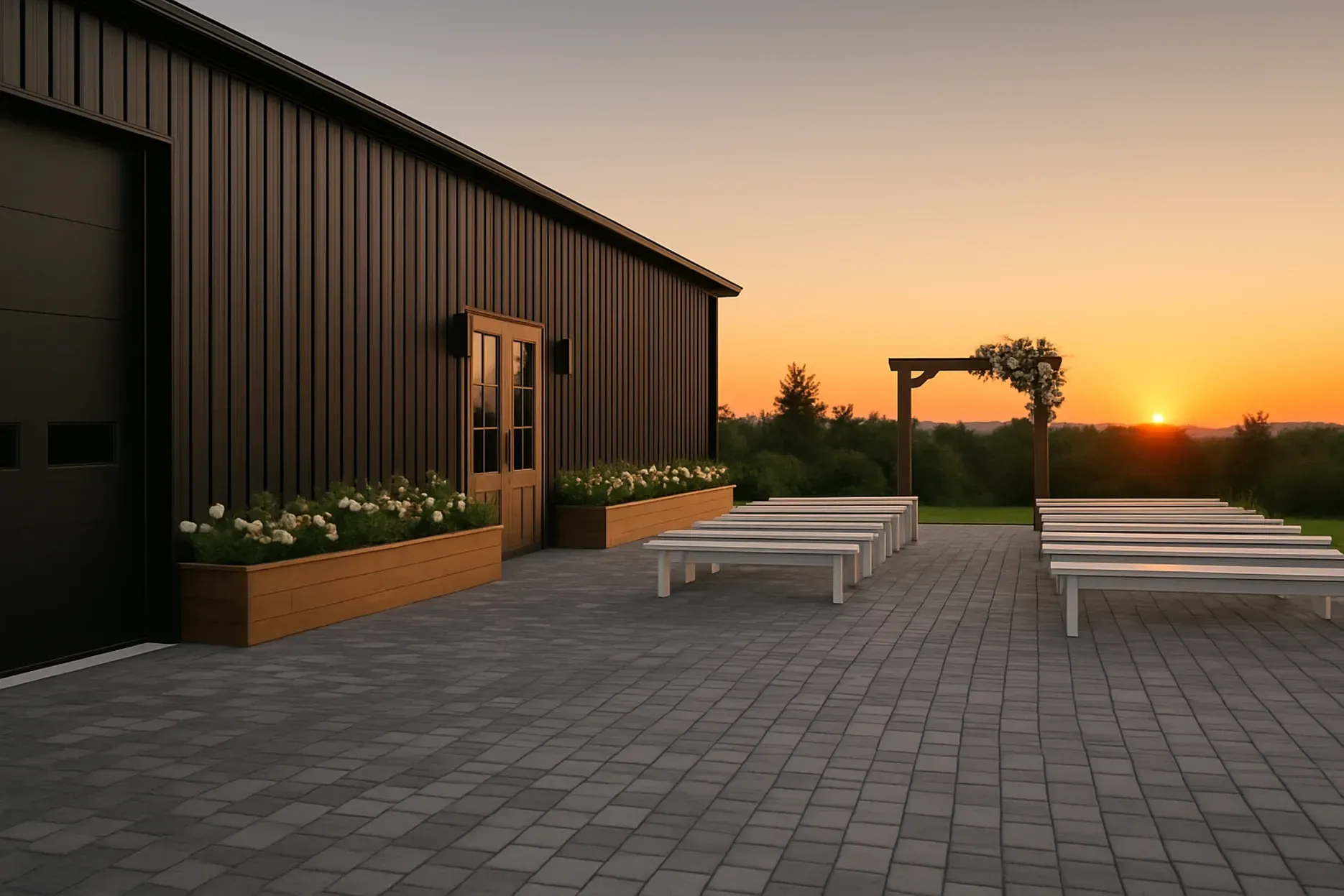 There is a table with flowers on it in the middle of the grass.