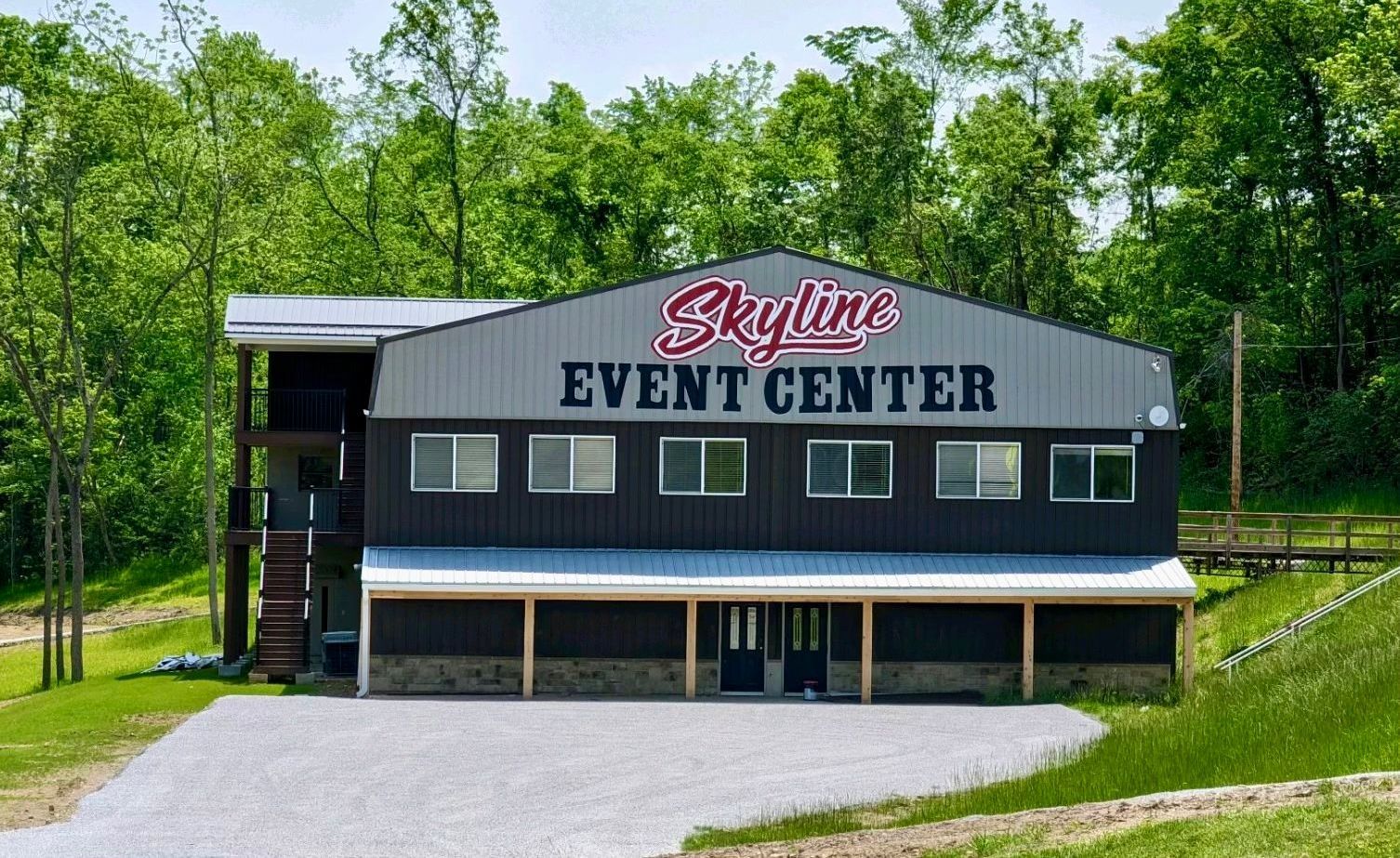 a large building with a sign that says skyline event center