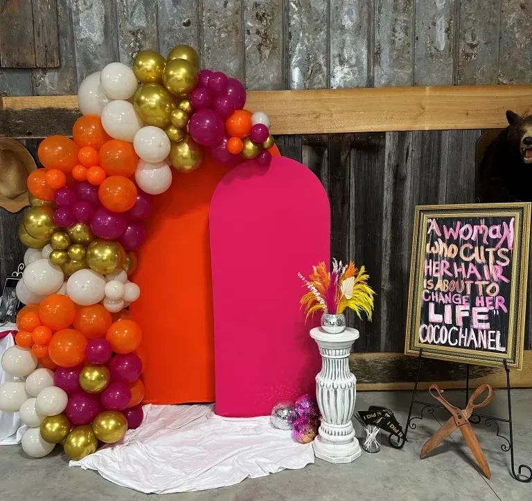 A sign that says a woman who cuts her hair