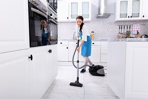 Maid Cleaning In Kitchen ─ Maid Service Virginia Beach, VA