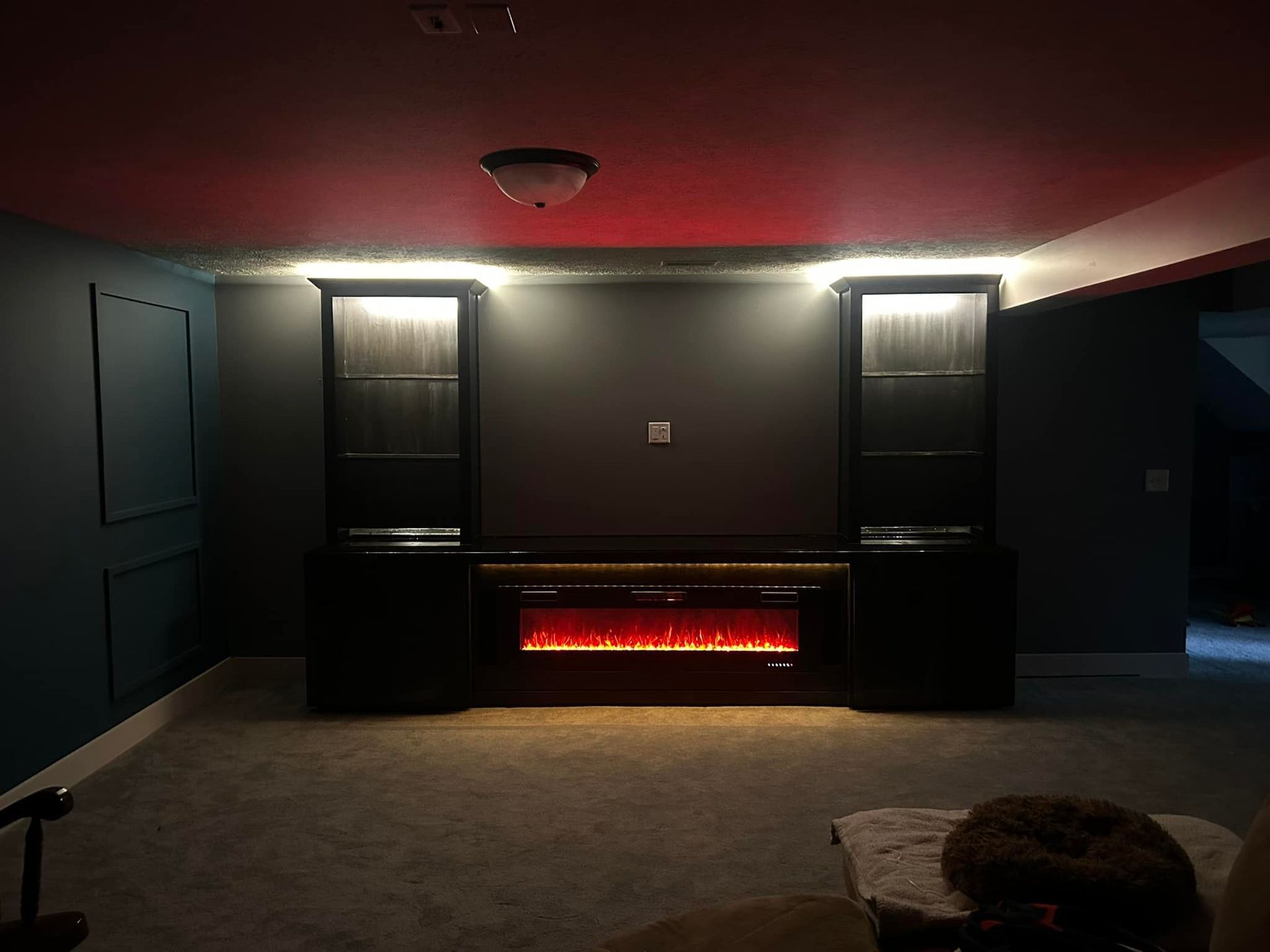There is a fireplace in the middle of the room.