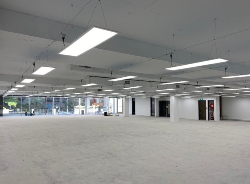 A Large Empty Room With A Lot Of Lights On The Ceiling – Brendale, QLD - DB Electrical