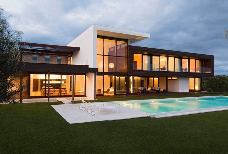 A Large House With A Swimming Pool In Front Of It – Brendale, QLD - DB Electrical