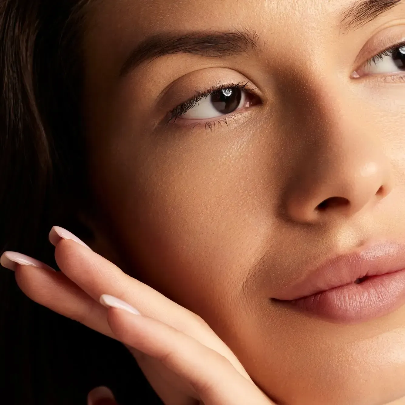 A close up of a woman's face.