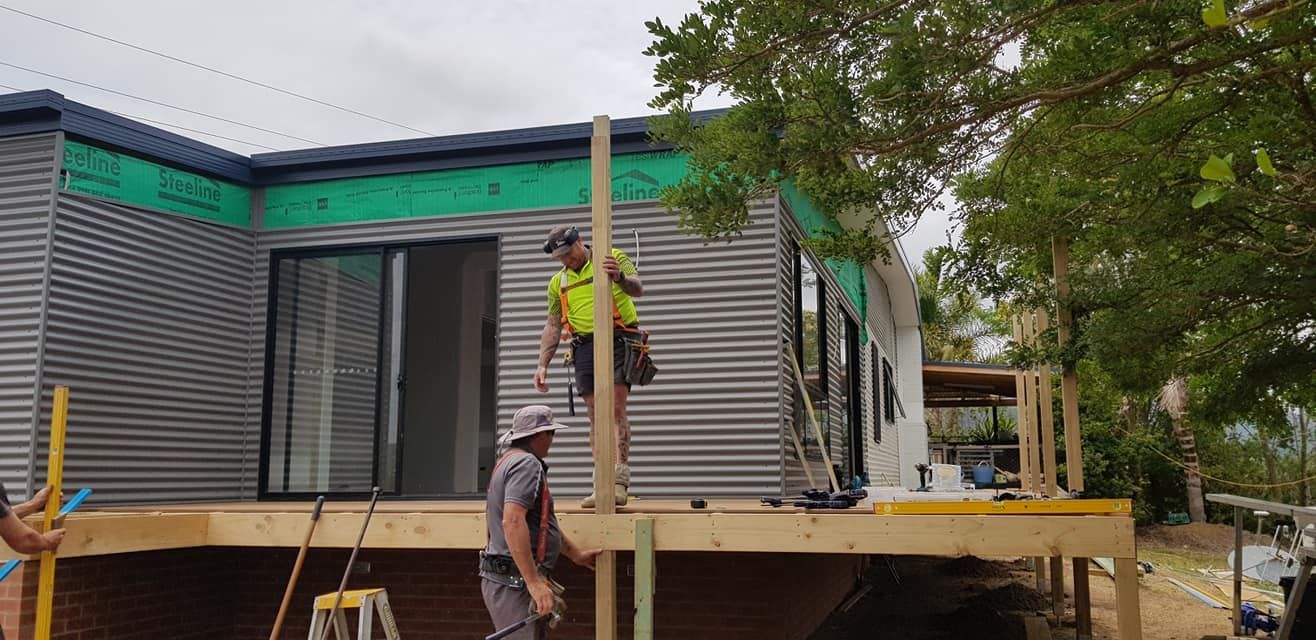 Workers Constructing Deck — Bega, NSW — Bajjada Drafting and Design