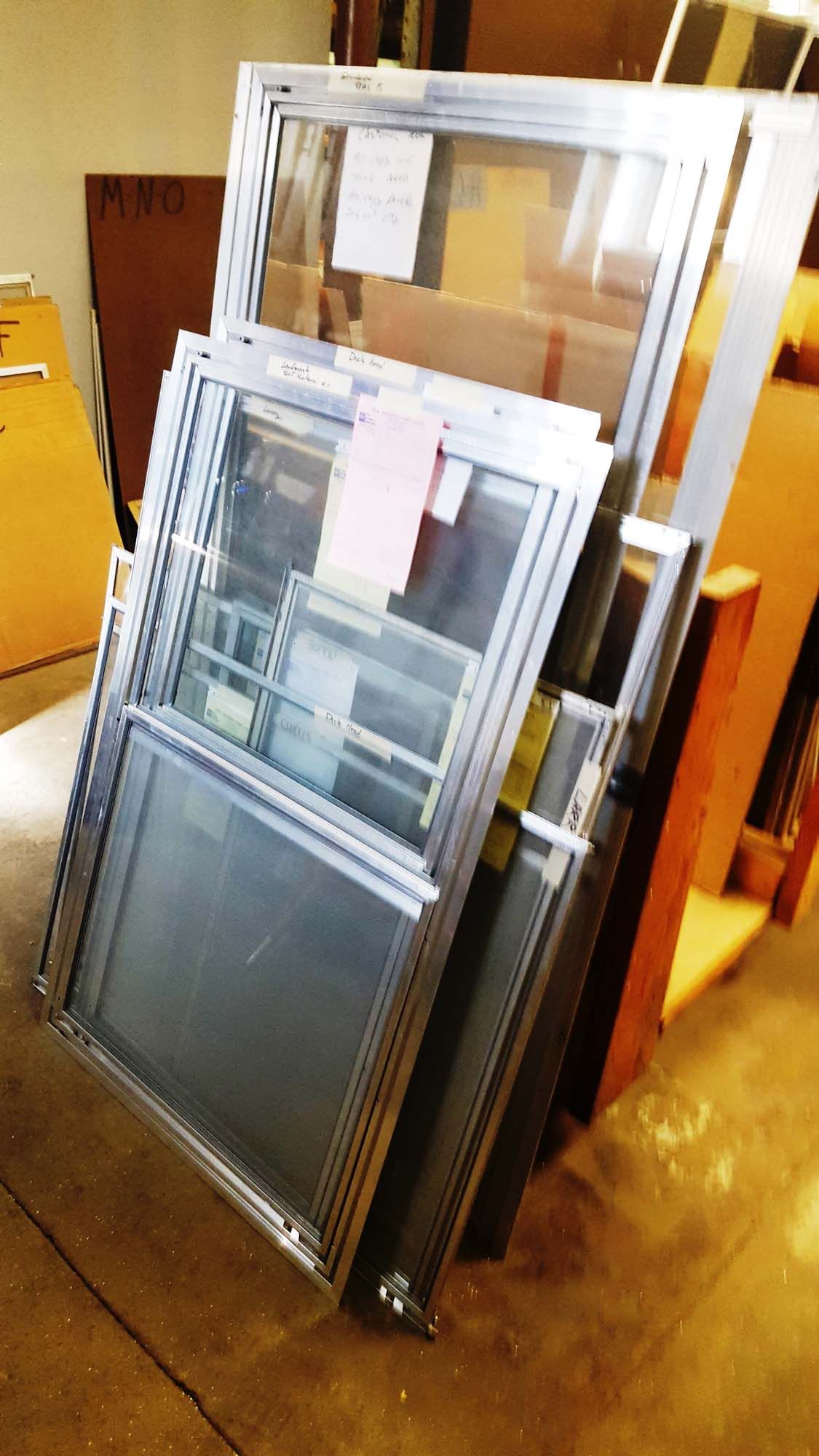 A group of men are working in a workshop.