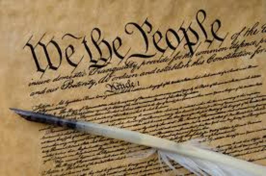 U. S. Constitution with quill pen