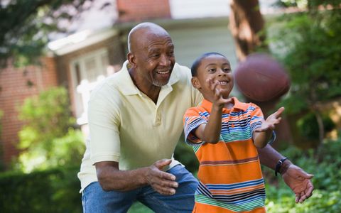 Elder Man and Boy Playing with the Ball — Atlanta, GA — Piedmont Health Center