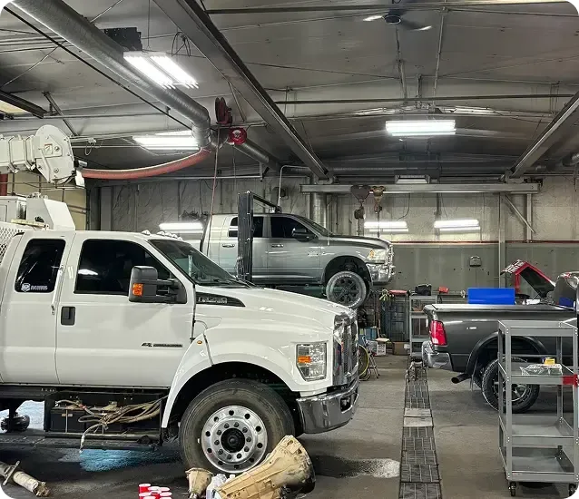 trucks in auto garage | High Rize Diesel