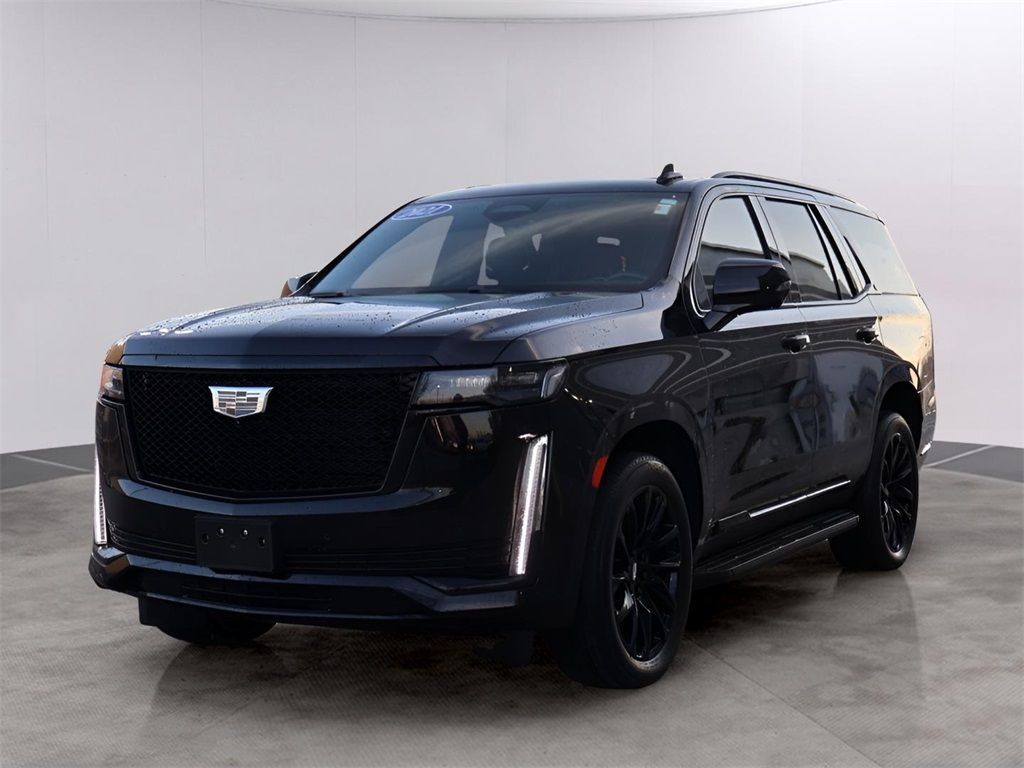 A black cadillac escalade is shown on a white background.