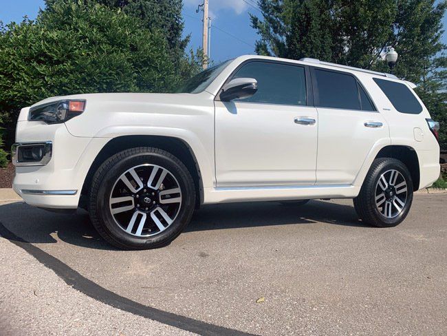 toyota 4 runner in front of the new car image