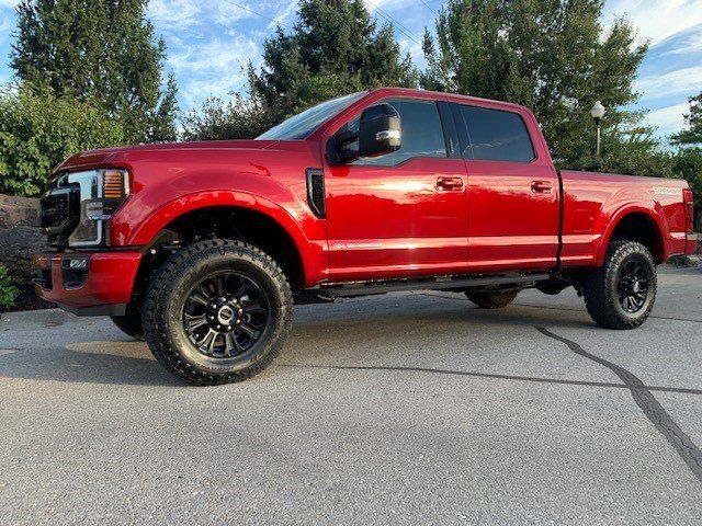 F250 Tremor in Front of The New Car Image