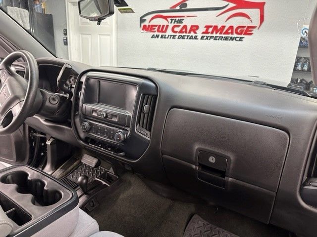 The inside of a car with a sign that says the new car image