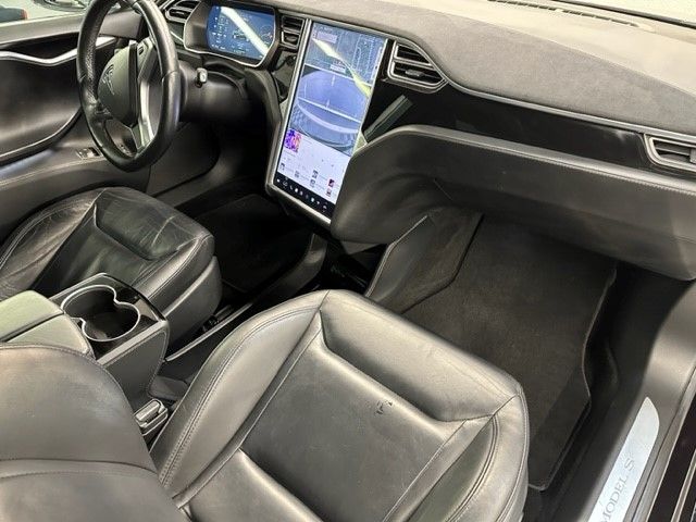 The interior of a tesla model s is shown