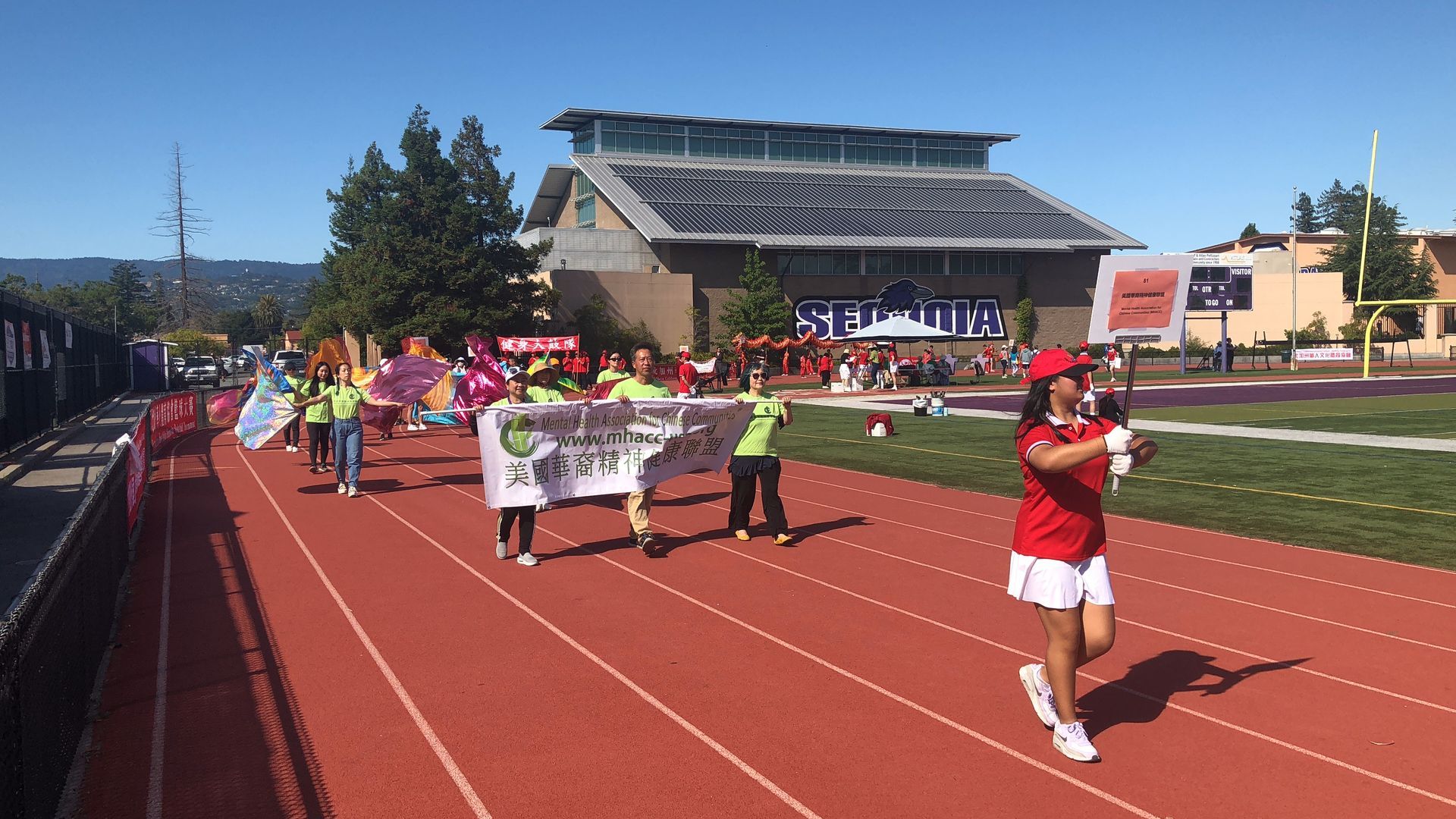 MHACC march together during the opening ceremony