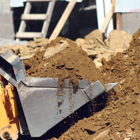 Excavator digging dirt