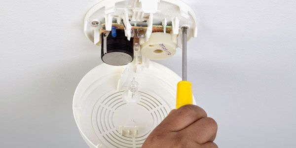 Expert installing the fire protection system