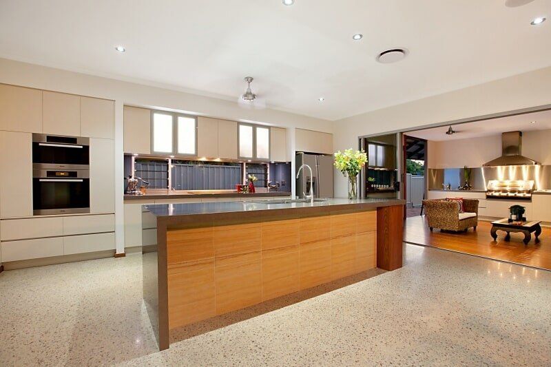 A Large Kitchen with A Large Island in The Middle — Custom Cabinets Design in Virginia, NT