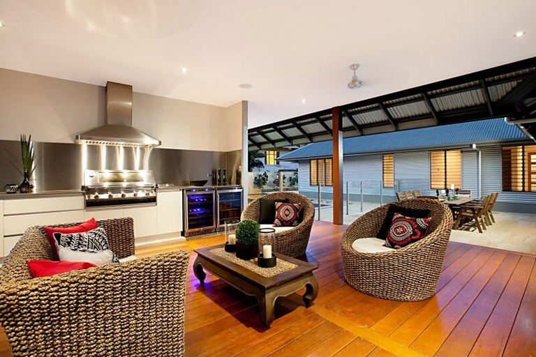 Outdoor Kitchen With Wicker Chairs — Custom Cabinets Design in Winnellie, NT