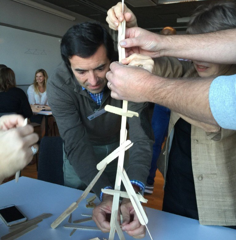 Paul Nunesdea building a sticks tower