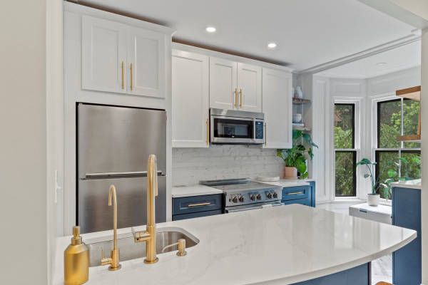 Kitchen with White Cabinets, and Appliances
