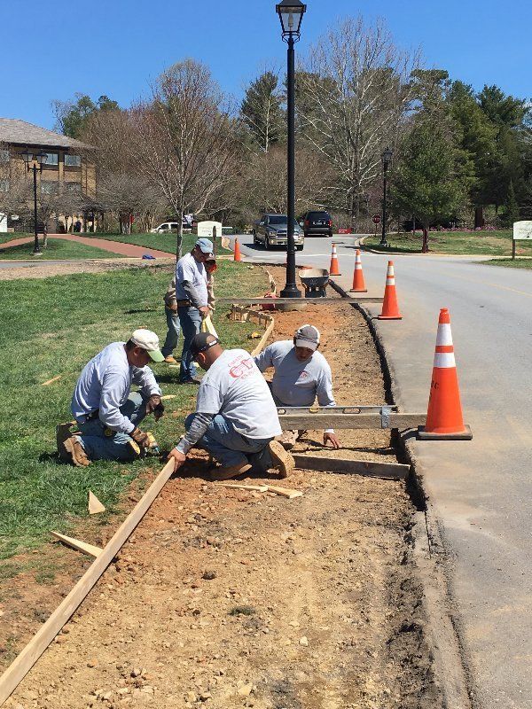 Men Forming Concrete — Horseshoe, NC — Carolina Concrete Designs Inc