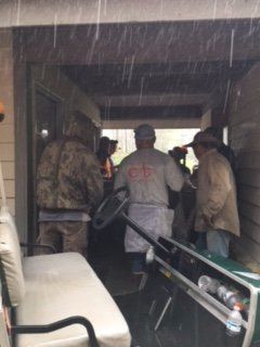 Men On Shelter During Rain — Horseshoe, NC — Carolina Concrete Designs Inc