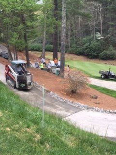 Men Working On Golf Path — Horseshoe, NC — Carolina Concrete Designs Inc