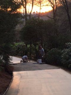 Men Working During The Evening — Horseshoe, NC — Carolina Concrete Designs Inc