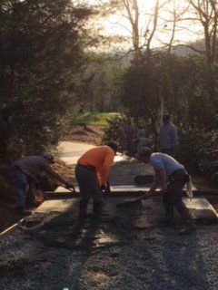 Men Leveling Concrete Path — Horseshoe, NC — Carolina Concrete Designs Inc