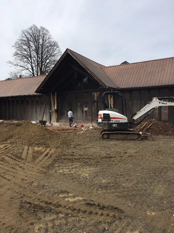 Leveling Land Using Bulldozer — Horseshoe, NC — Carolina Concrete Designs Inc